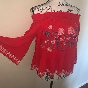 Red floral blouse